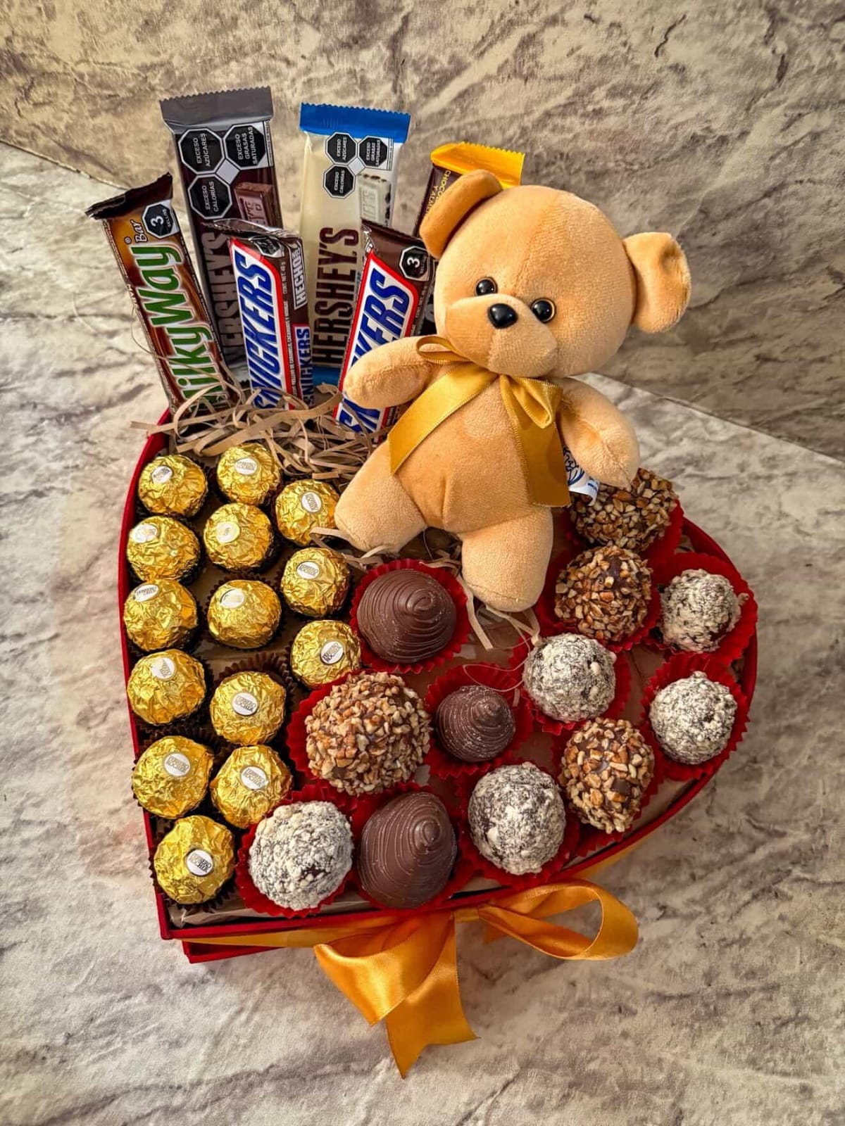 Corazon con peluche